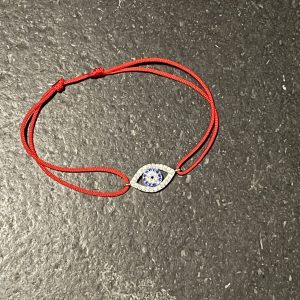 Bracelet fil rouge coulissant œil strass argent