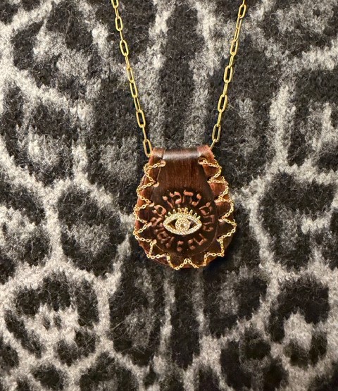 Collier Petek œil  en  cuir